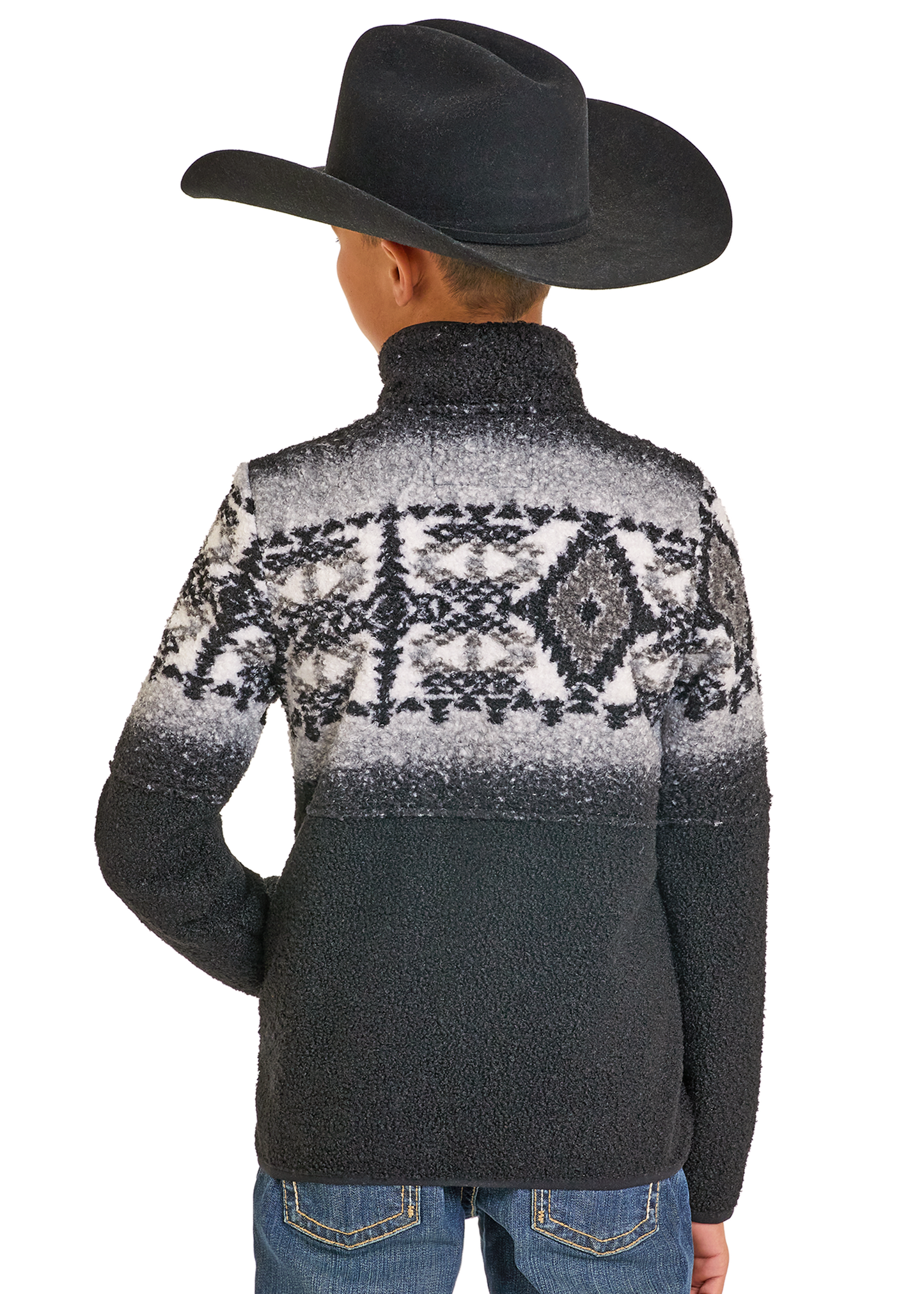 Person wearing a patterned sweater and cowboy hat on a white background