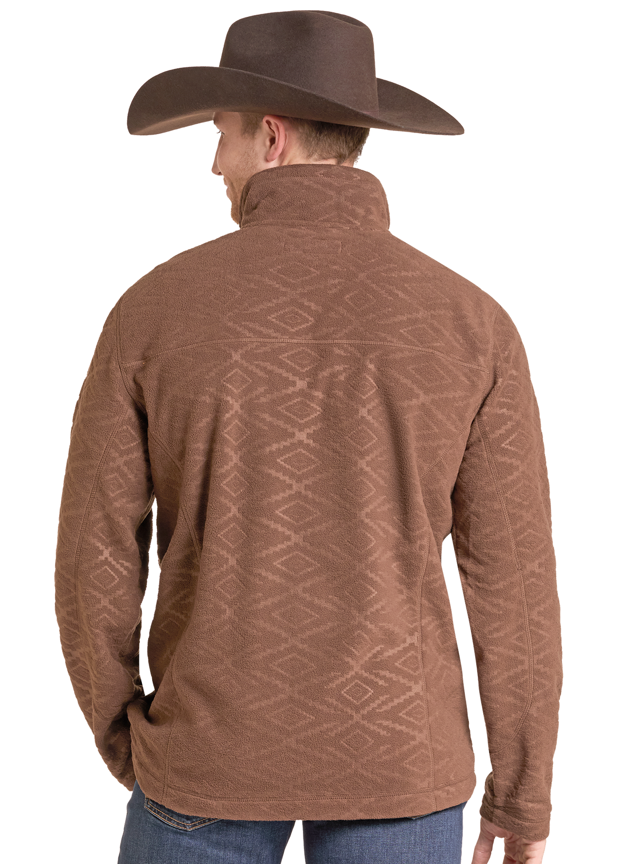 A man shown from the back wearing a brown long-sleeve fleece pullover with a subtle geometric diamond pattern, paired with a brown cowboy hat and blue jeans