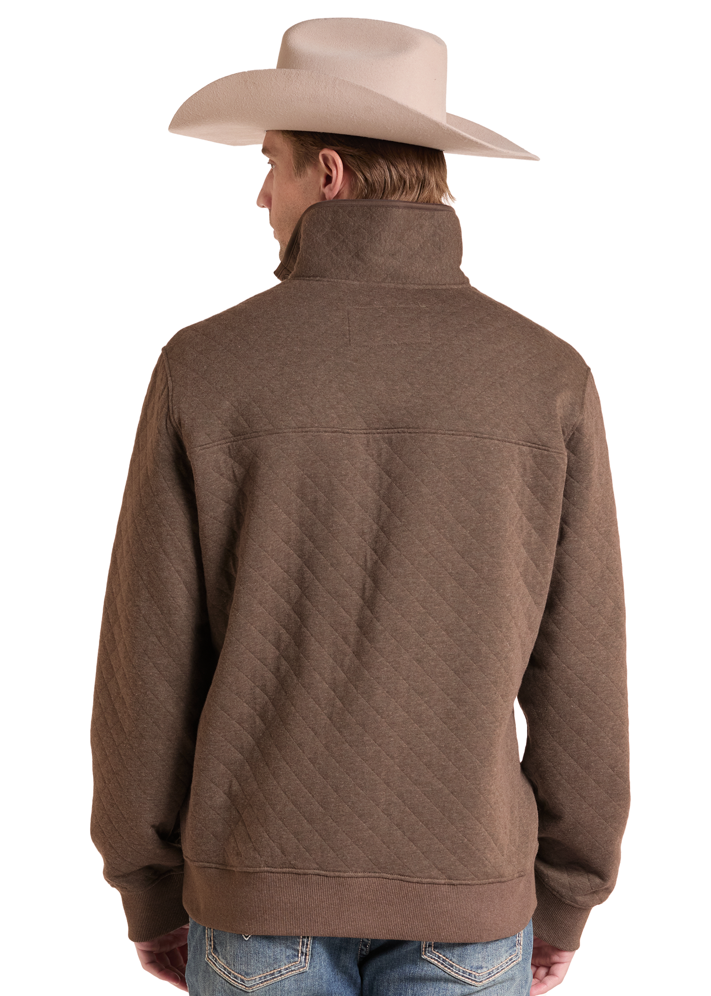 A man shown from the back wearing a brown quilted quarter-zip pullover jacket, a light beige cowboy hat, and blue jeans against a white studio background.
