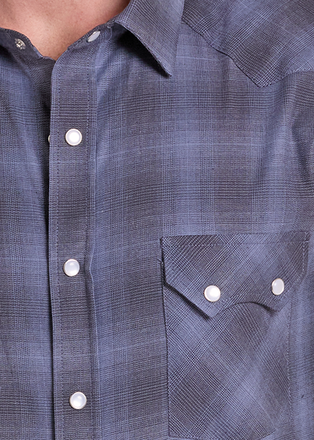 A Western plaid shirt in blue with chest pocket and snap