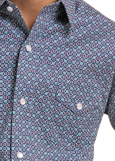 Detail image of a boys pearl snap, geometric print shirt with a snap chest pocket.