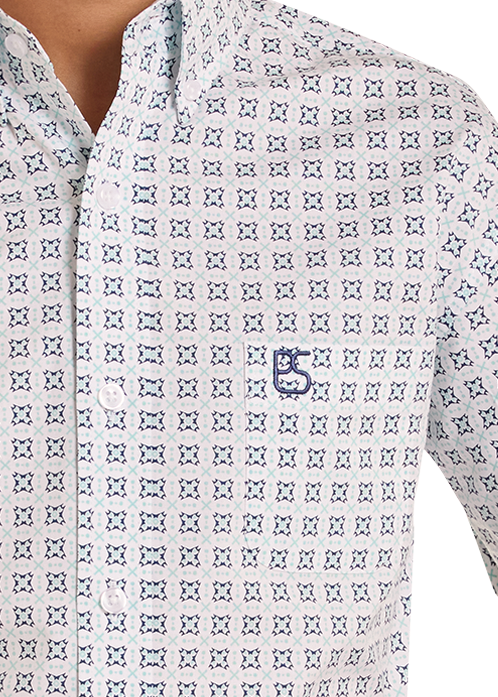 Child wearing a patterned shirt, jeans, and a cowboy hat on a white background