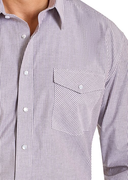 Man wearing a checkered shirt, jeans, and a black cowboy hat on a white background