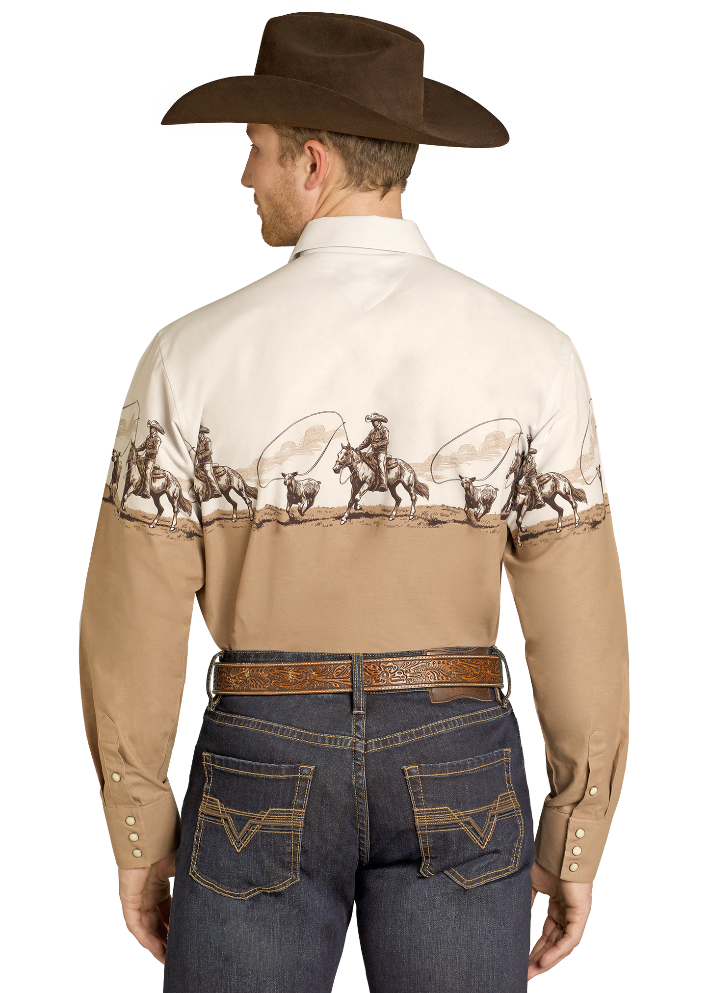 Man wearing a beige western shirt with embroidered designs on the back, dark jeans, and a brown cowboy hat.