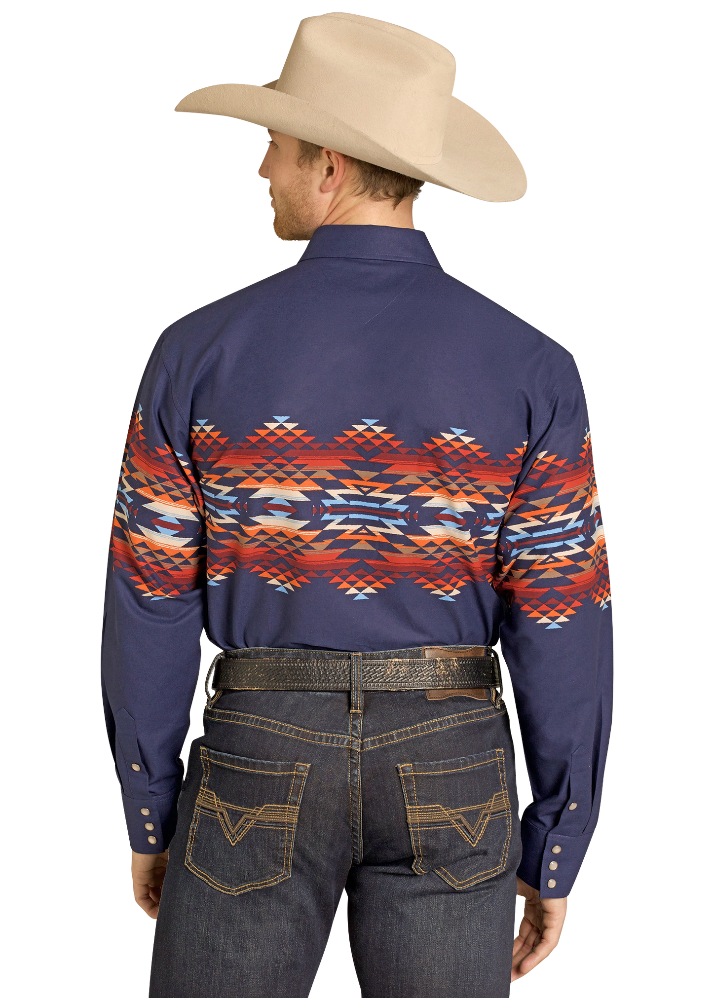 Man wearing a navy blue shirt with a colorful geometric pattern and jeans, back view.