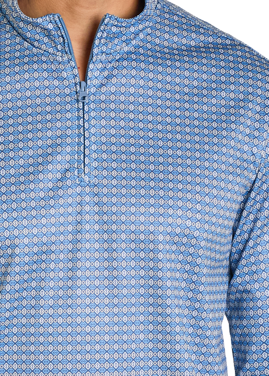 Close-up of a blue patterned shirt with a collar