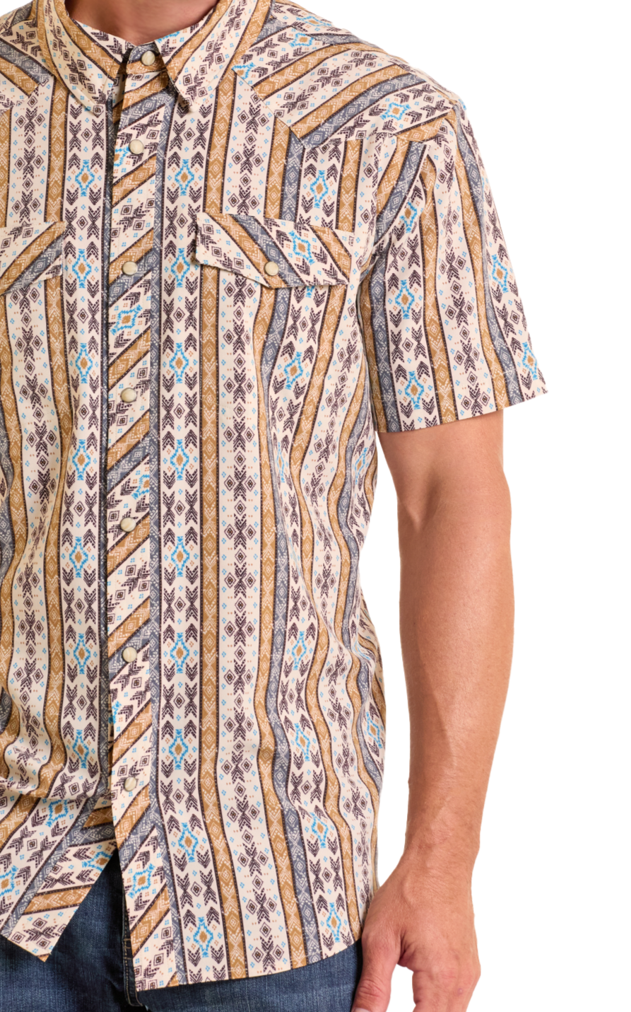 Man wearing a patterned short-sleeve shirt and cowboy hat on a white background