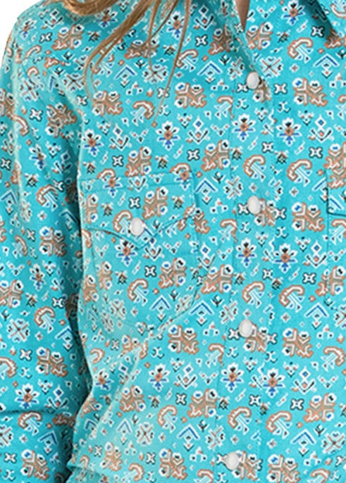 Close up of a girls pearl snap shirt.