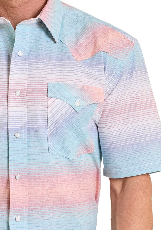 Man wearing a colorful short-sleeve shirt and cowboy hat on a white background