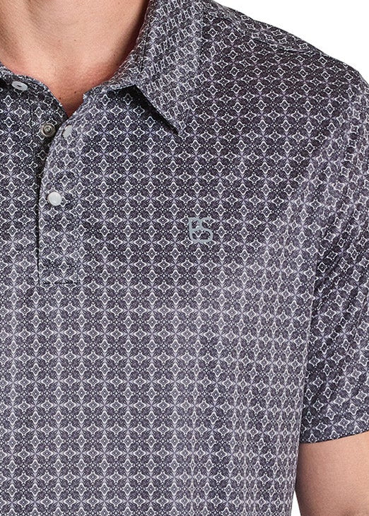 Close up of a black medallion men's polo
