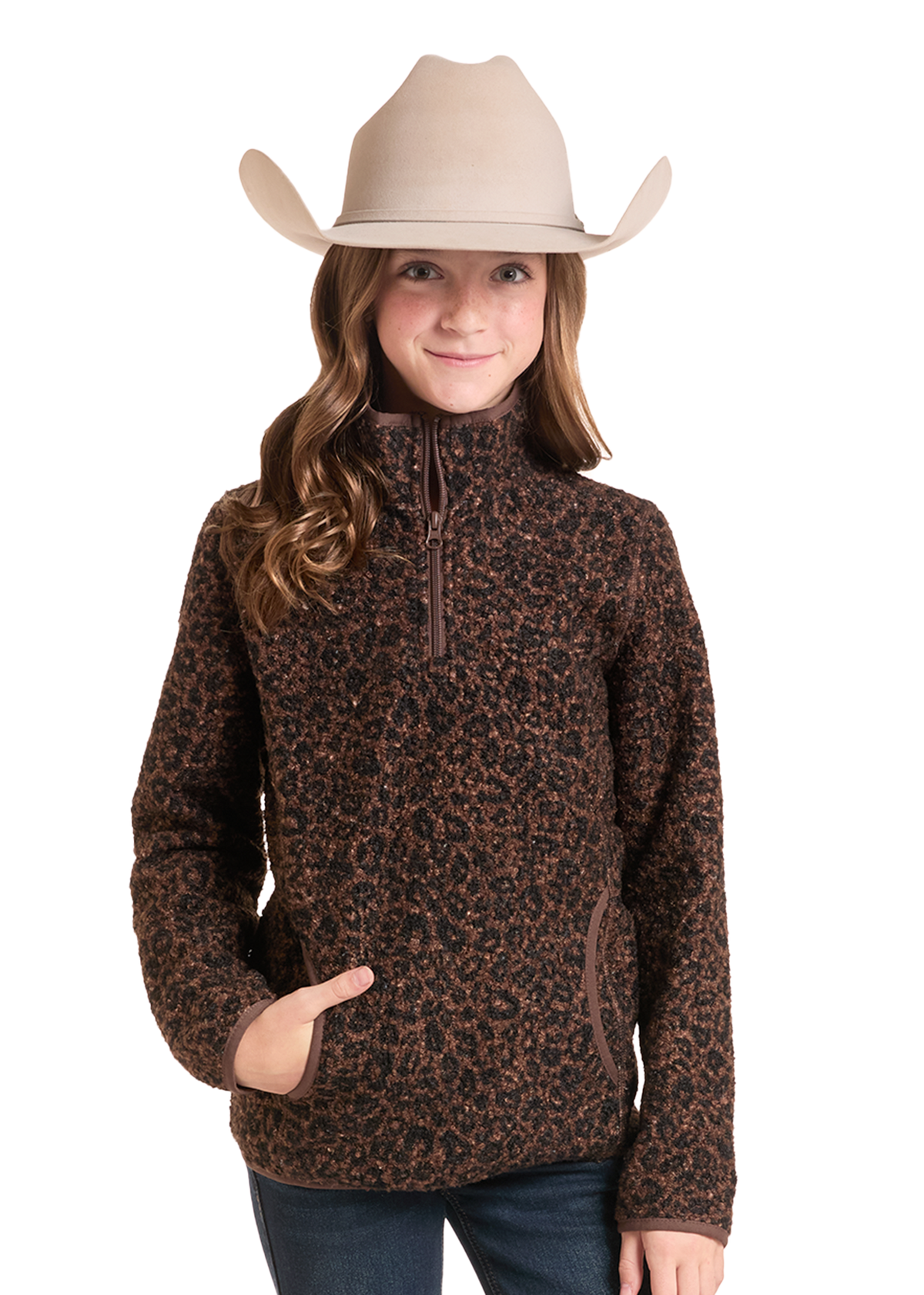 A young girl wearing a brown and black leopard-print quarter-zip fleece pullover sweater and a beige cowboy hat.