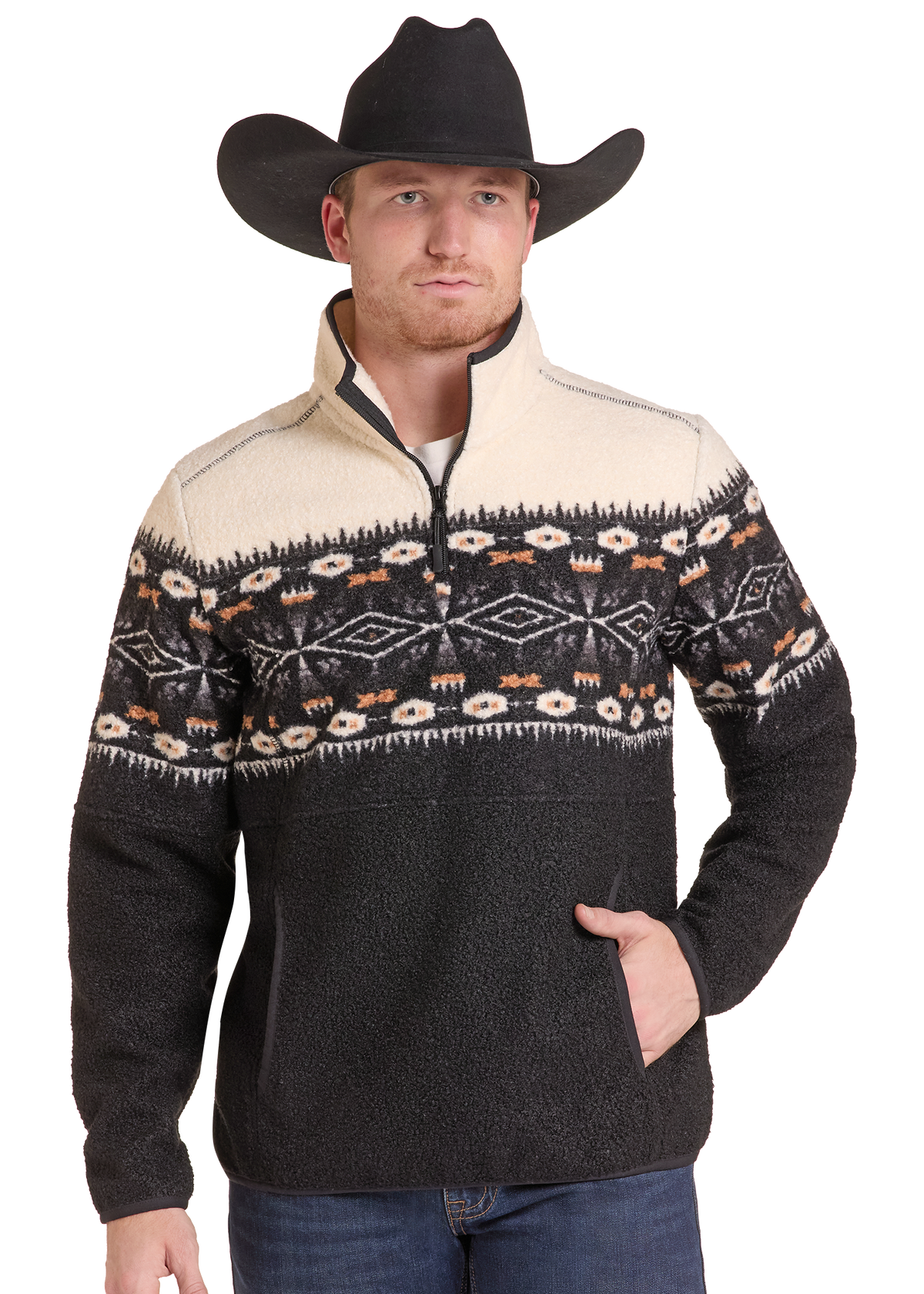 A man wearing a black cowboy hat and a dark charcoal quarter-zip fleece pullover sweater with a cream and patterned yoke, paired with blue jeans.