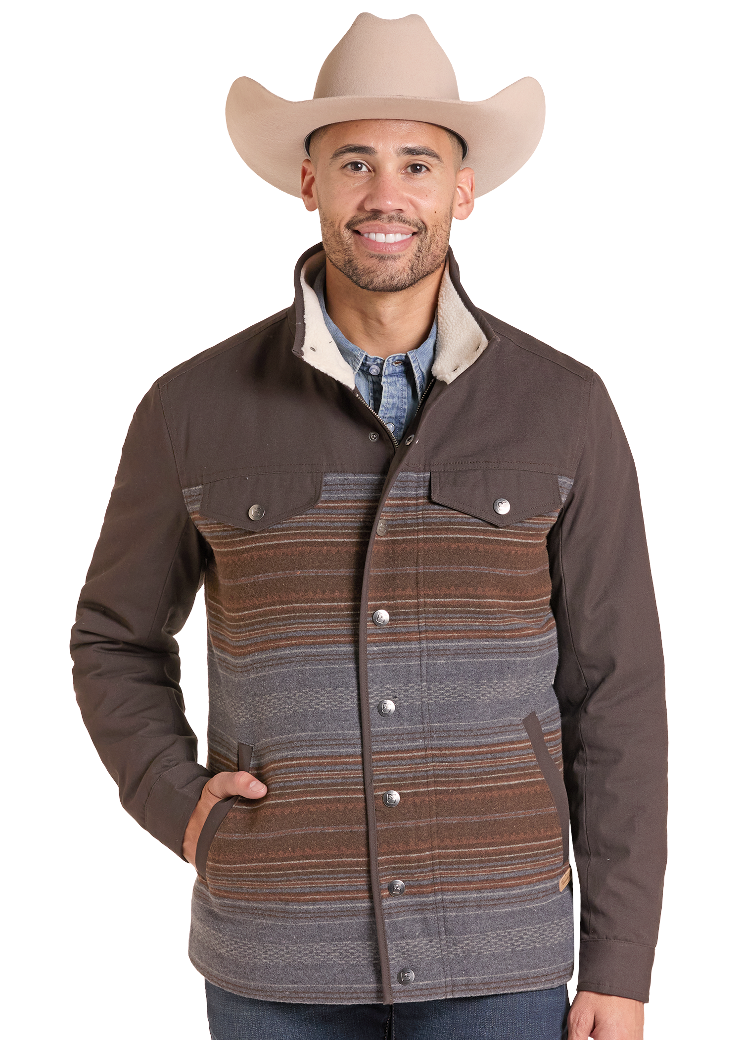A man wearing a brown and patterned western-style jacket with a beige cowboy hat.