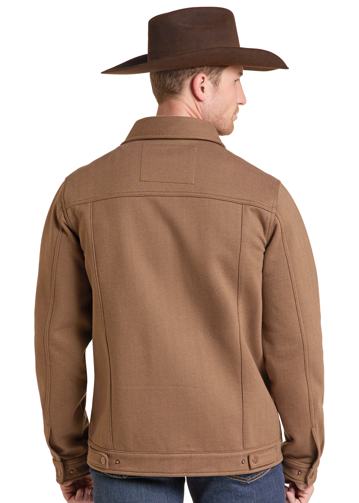 A man shown from the back wearing a brown cowboy hat and a brown jacket, paired with blue jeans, against a solid white background.