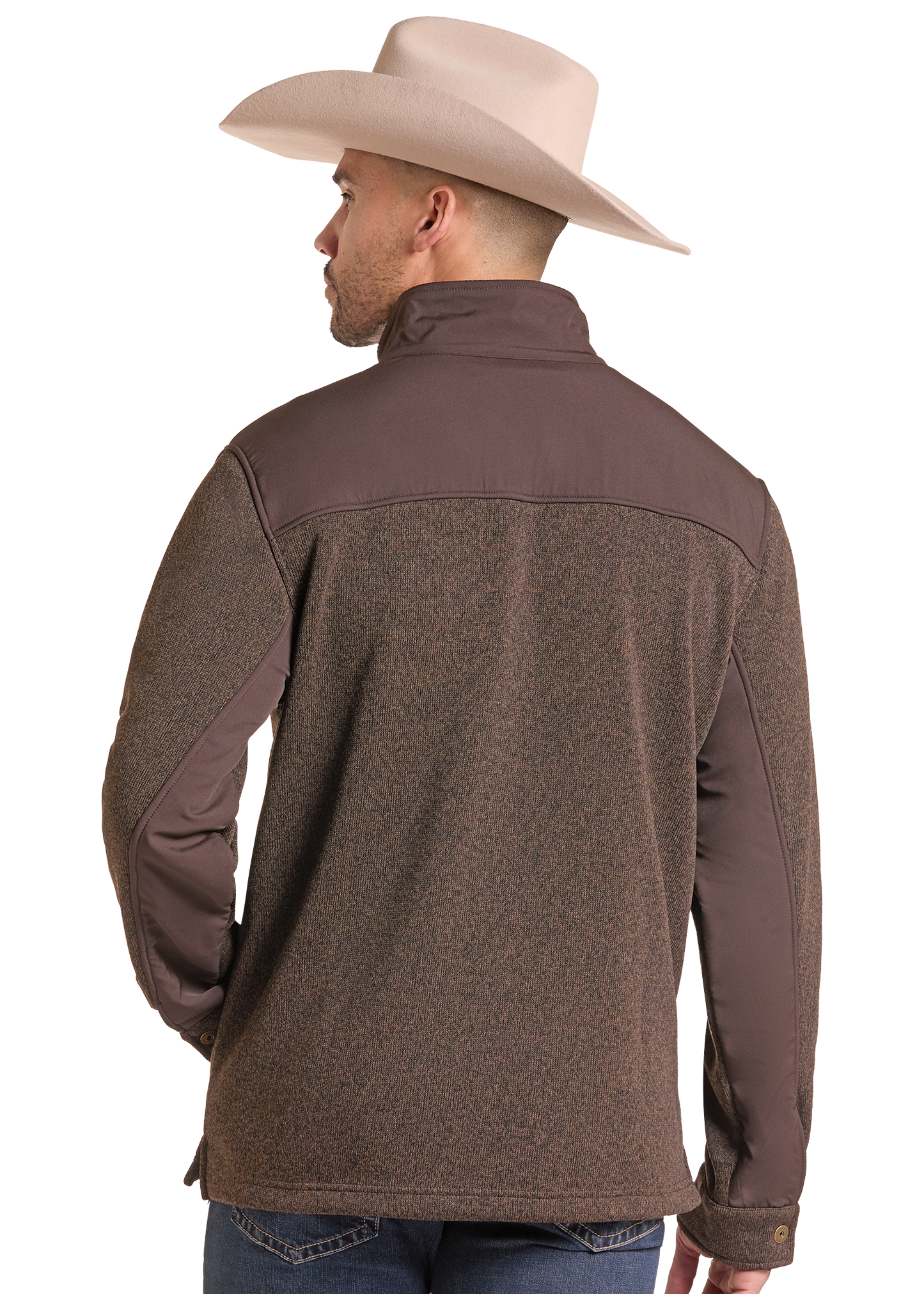 A man wearing a brown and dark brown color-block fleece pullover jacket, shown from the back. He is also wearing a light beige cowboy hat and blue jeans.