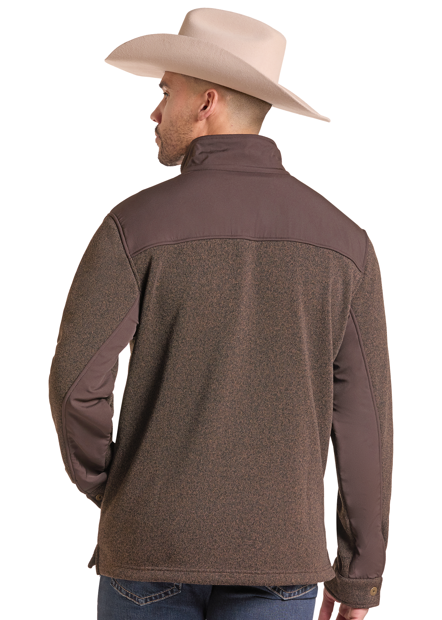A man wearing a brown and dark brown color-block fleece pullover jacket, shown from the back. He is also wearing a light beige cowboy hat and blue jeans.