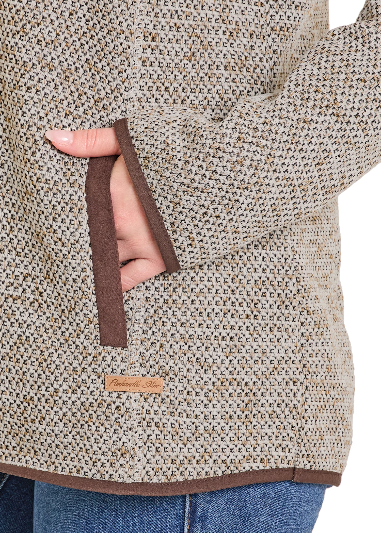 Close-up of a textured jacket with a brand logo on a white background