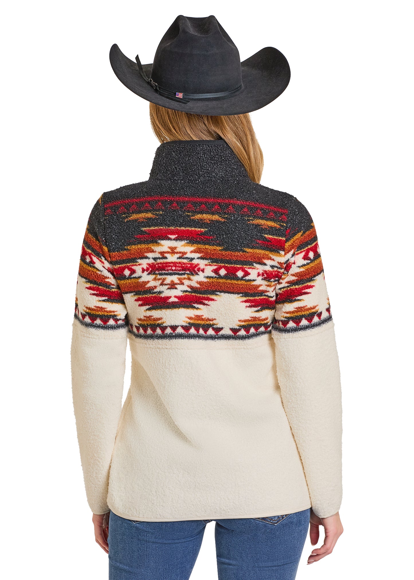 Person wearing a patterned sweater with a cowboy hat on a white background