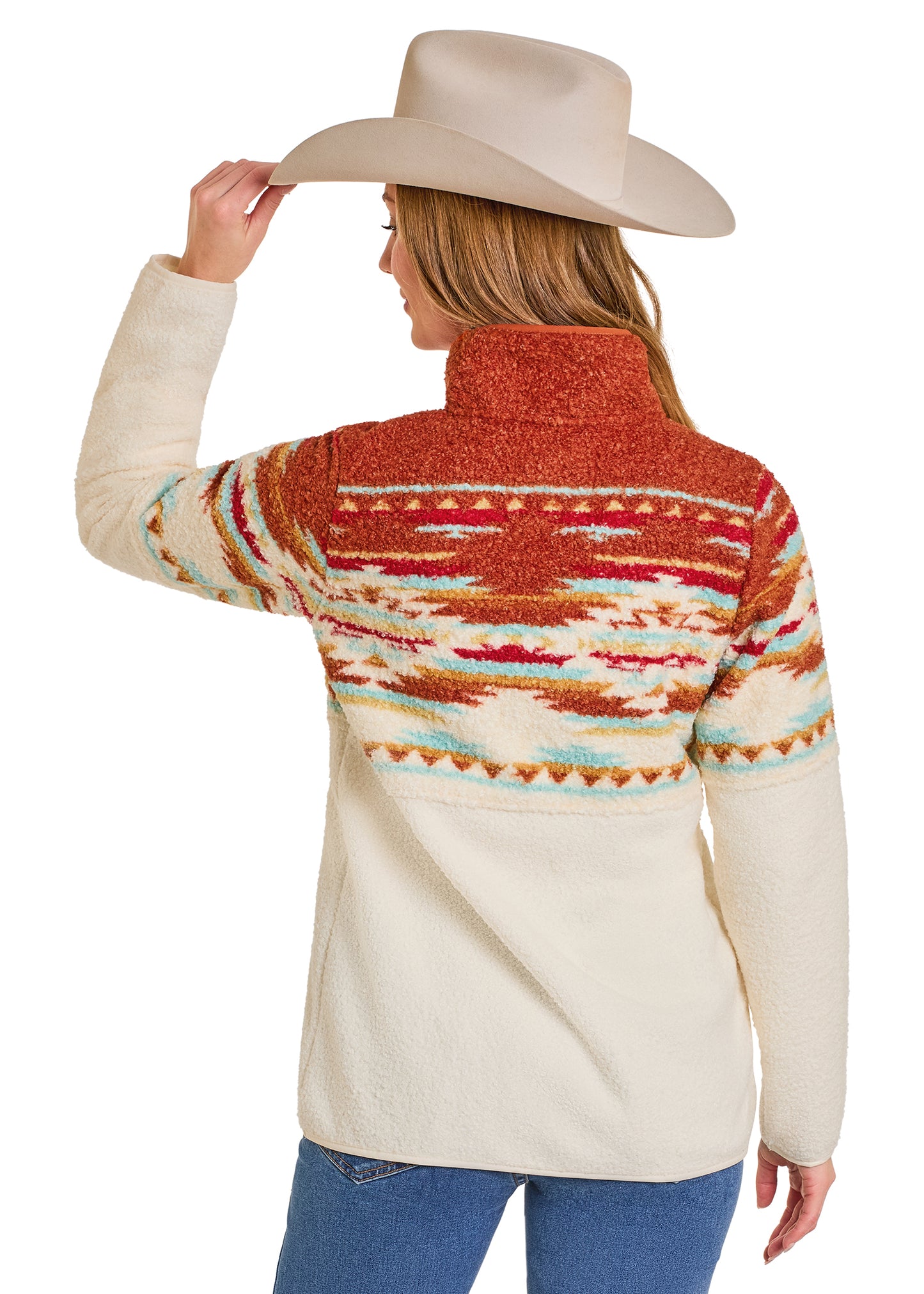 Person wearing a patterned sweater with a white background