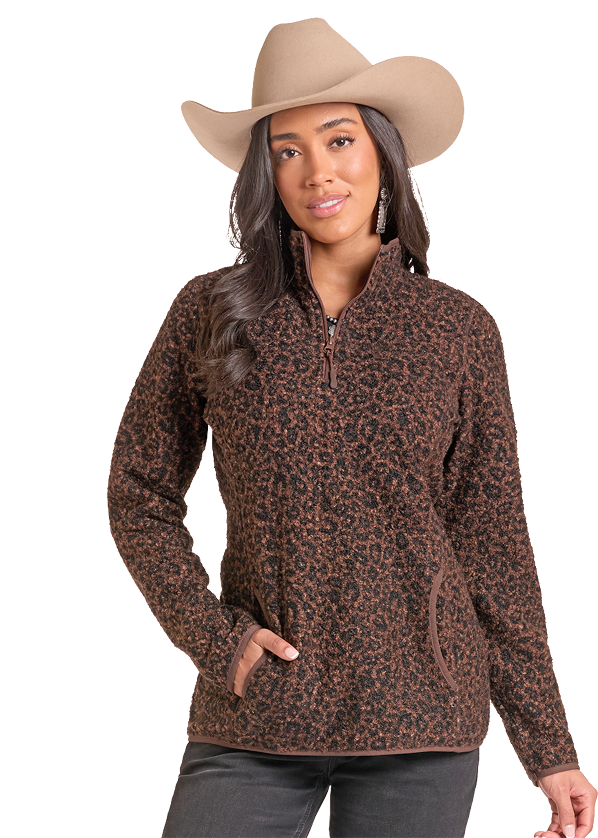 A woman modeling a brown and black leopard-print quarter-zip fleece pullover with a tan cowboy hat.