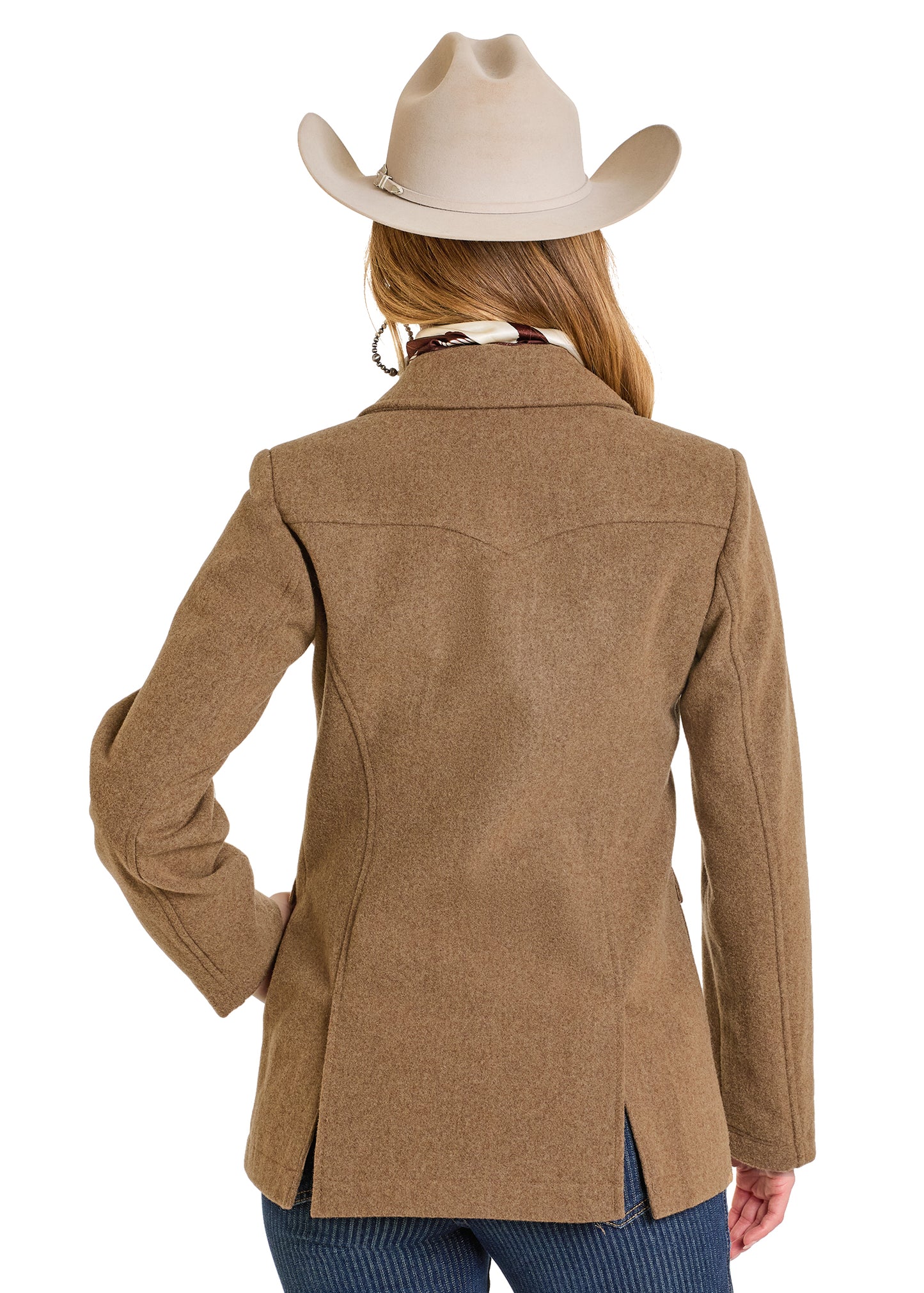 Woman wearing a brown jacket and beige cowboy hat on a white background