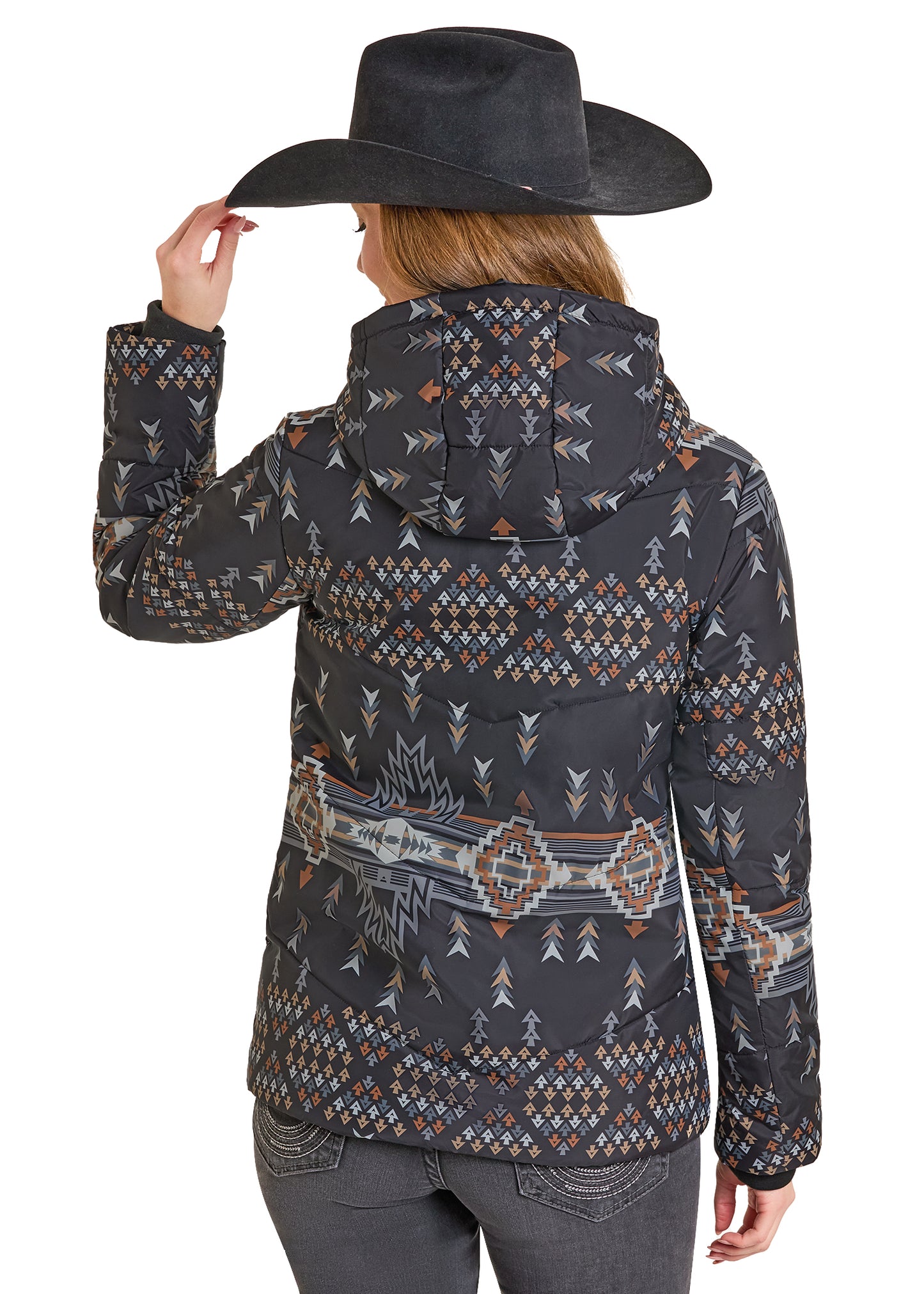 Person wearing a patterned jacket and black cowboy hat on a white background