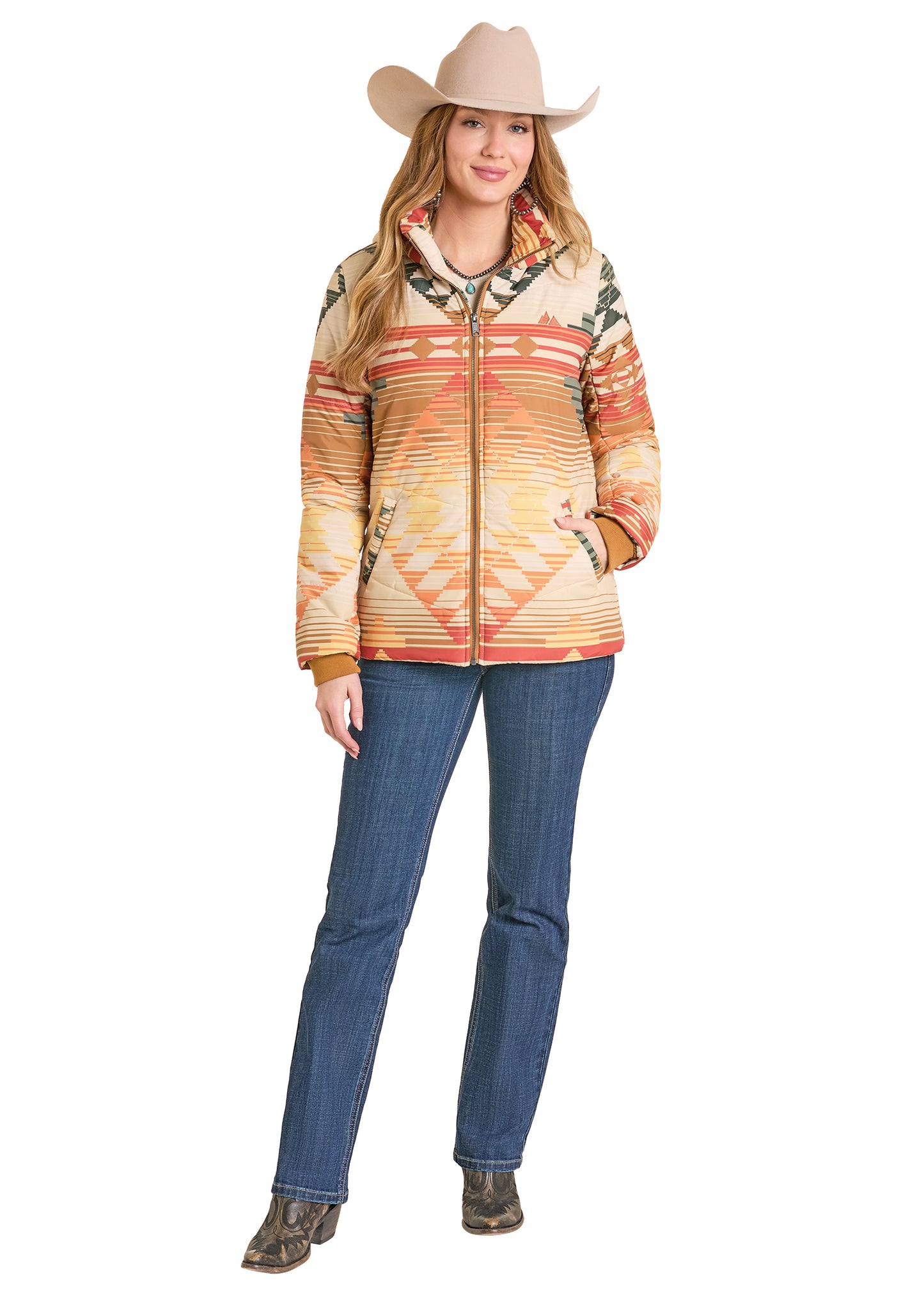 Woman wearing a patterned jacket and cowboy hat on a white background