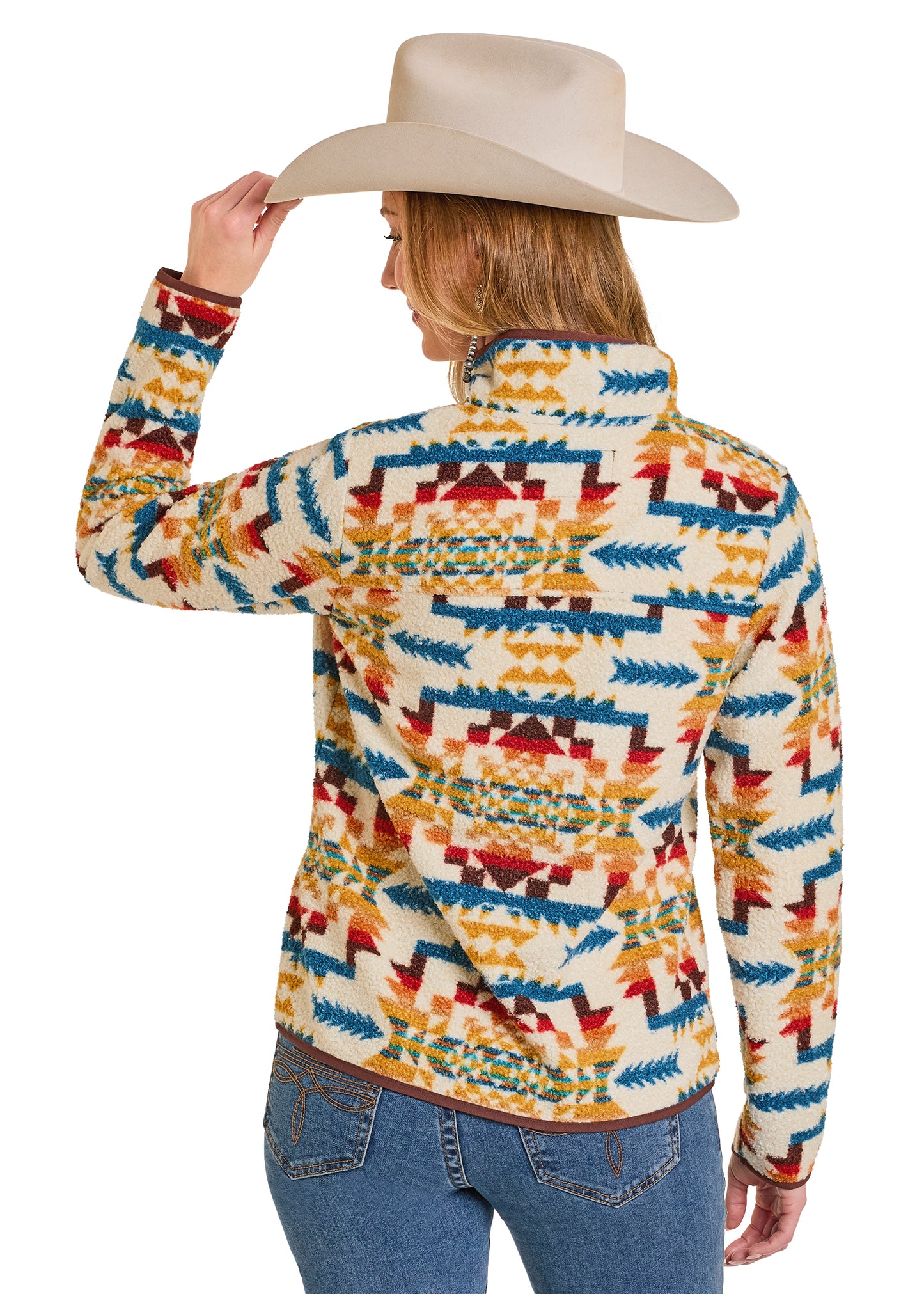 Person wearing a colorful patterned shirt and cowboy hat on a white background