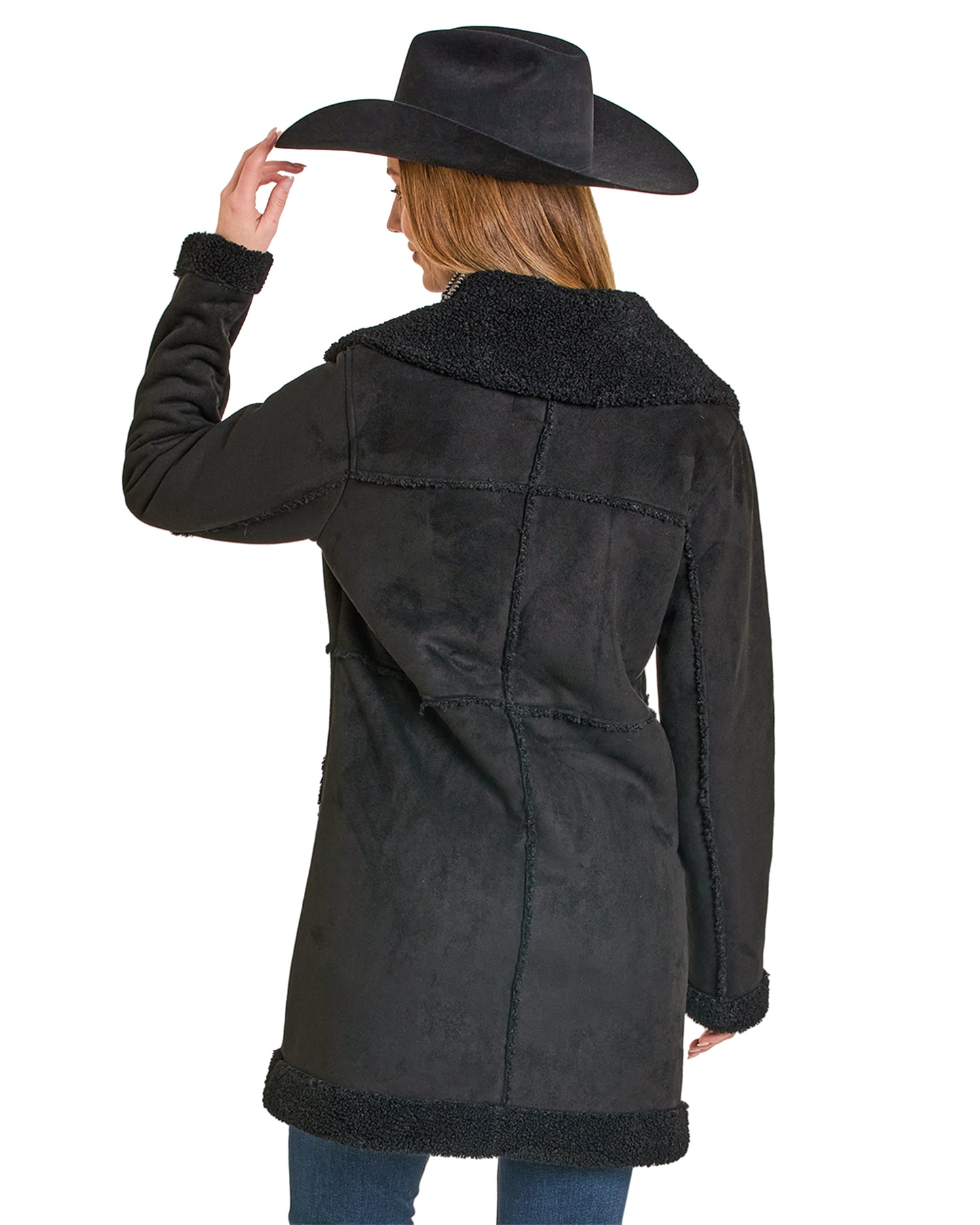Person wearing a black coat with a wide-brimmed hat on a white background