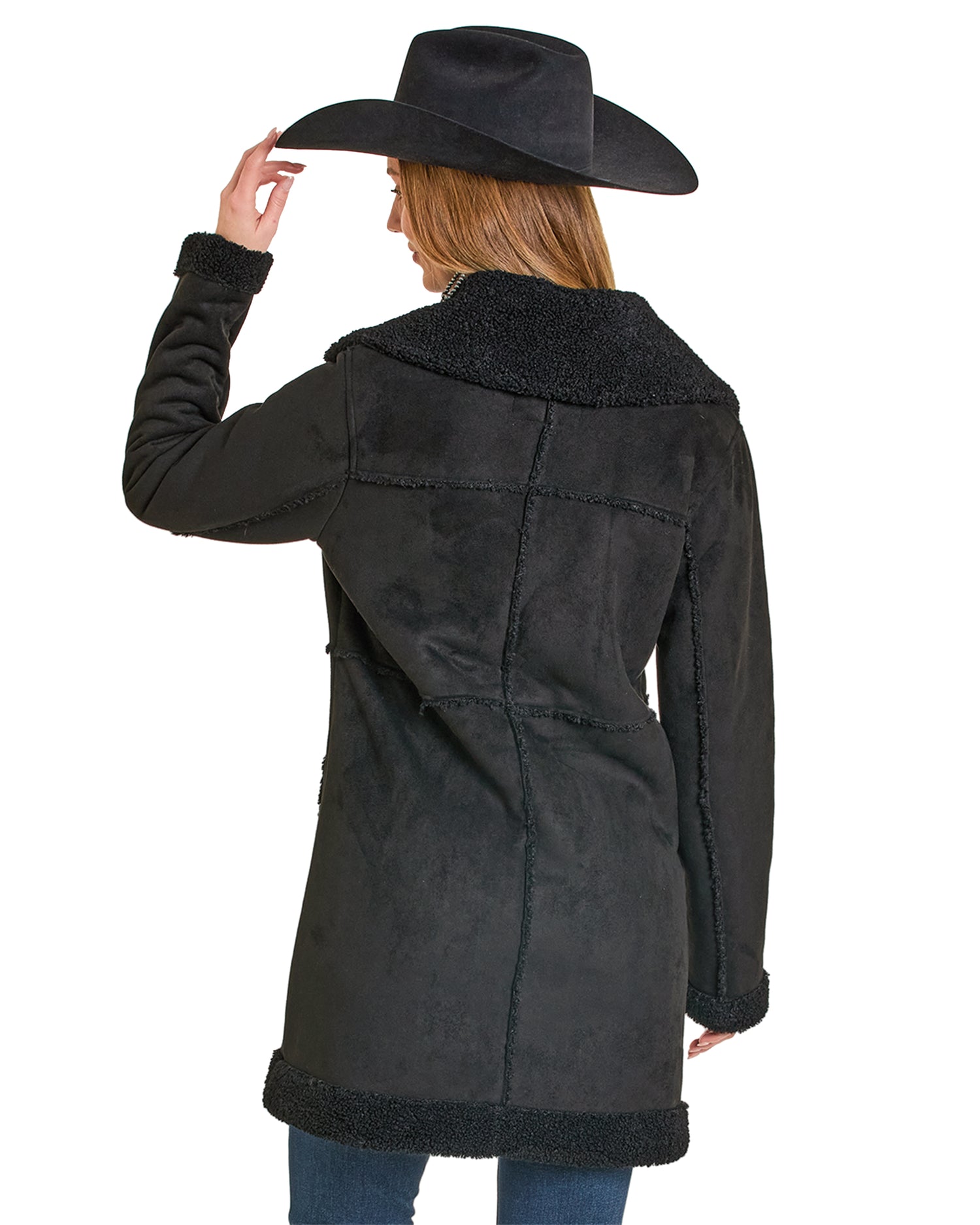 Person wearing a black coat with a wide-brimmed hat on a white background