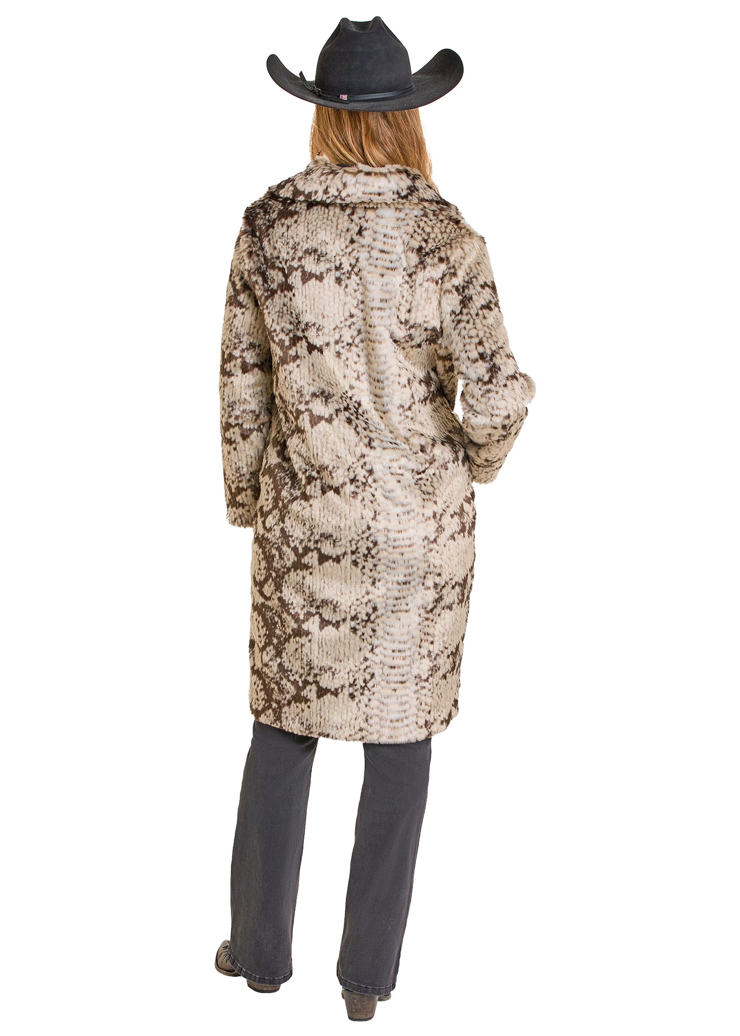 Person wearing a patterned coat and cowboy hat on a white background