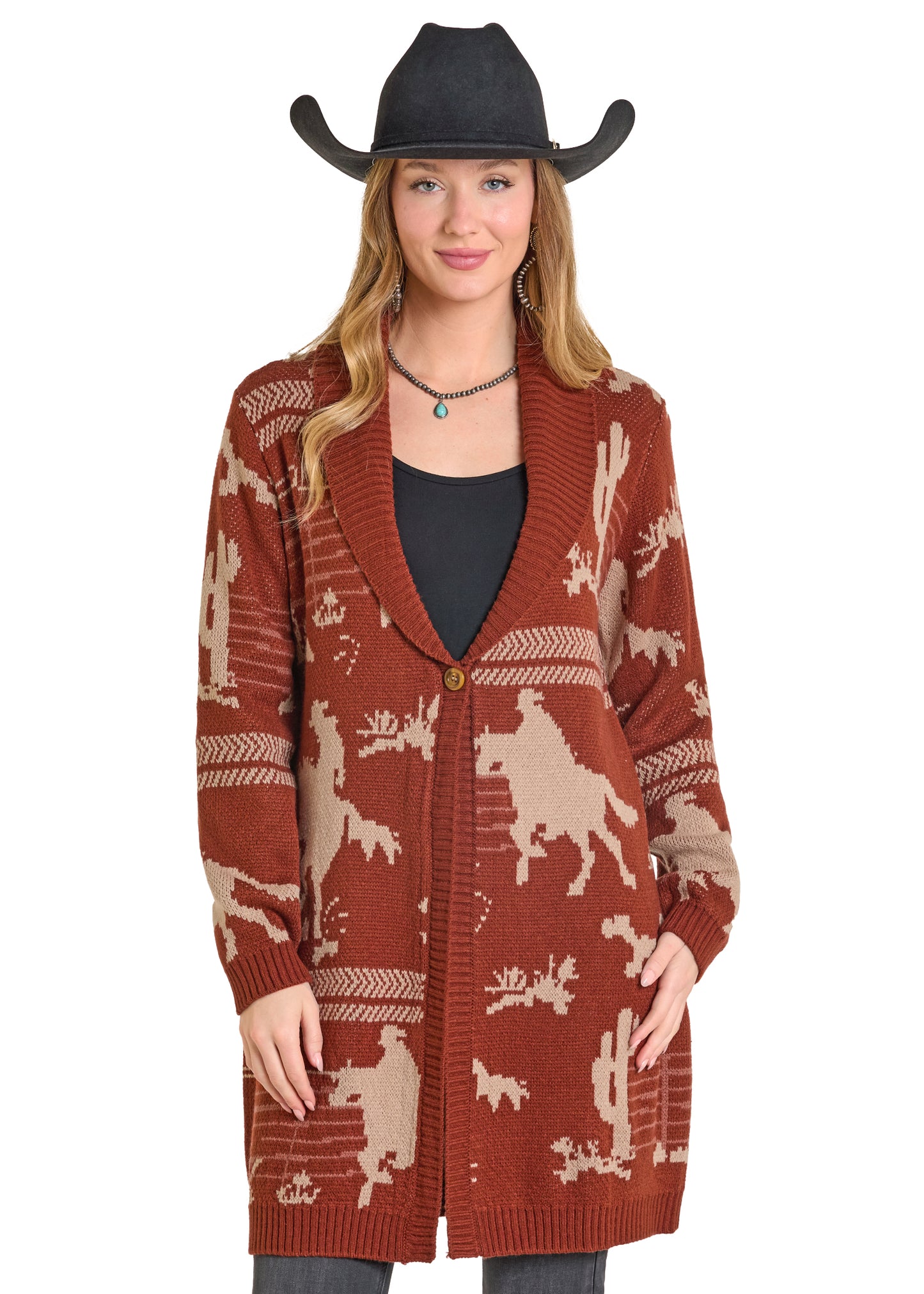 Woman wearing a patterned cardigan with cowboy hat on a white background