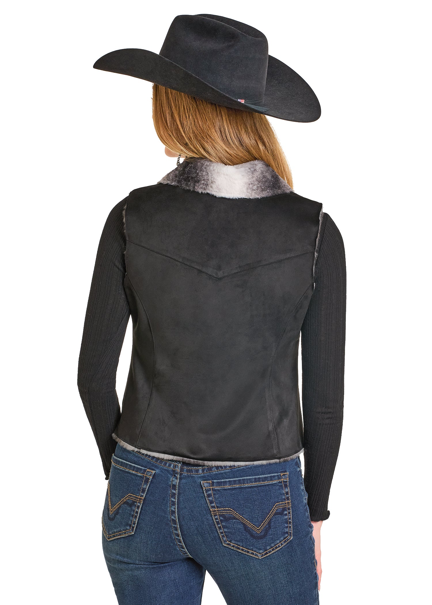 Person wearing a black leather vest, blue jeans, and a black cowboy hat on a white background