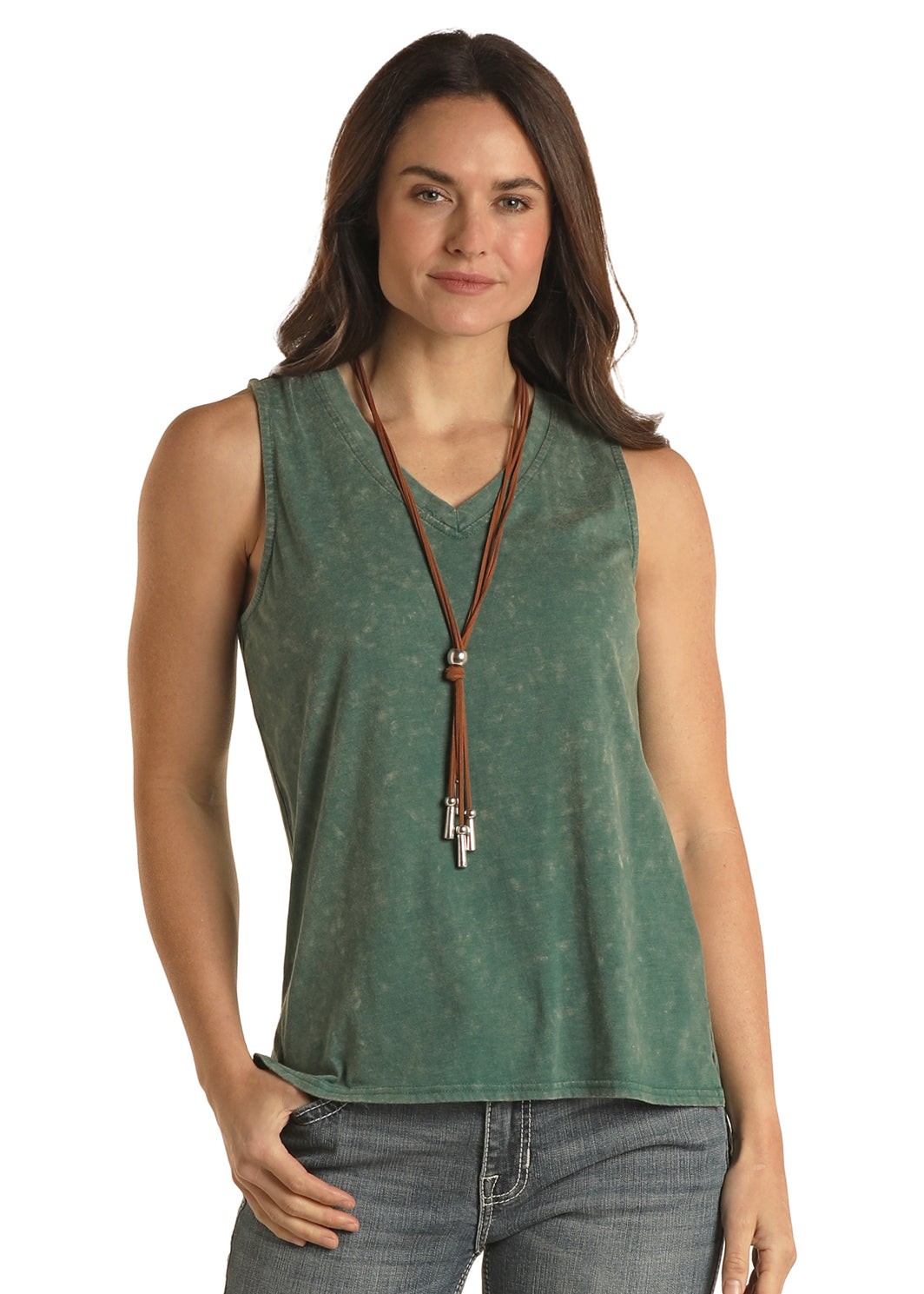 Woman wearing a green sleeveless top with a brown leather necklace on a white background