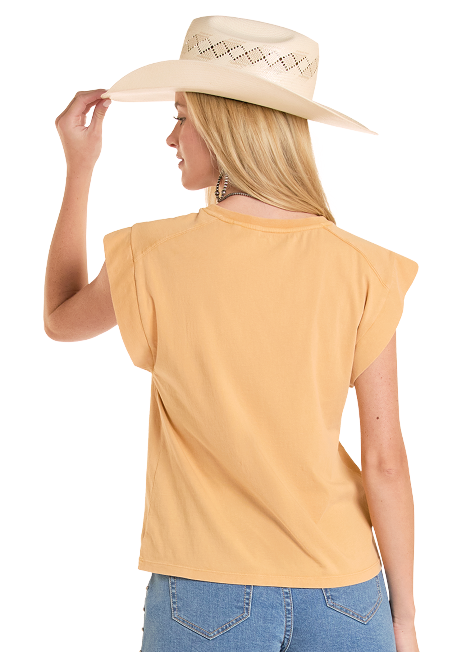 Woman wearing a yellow top and blue jeans with a beige cowboy hat on a white background