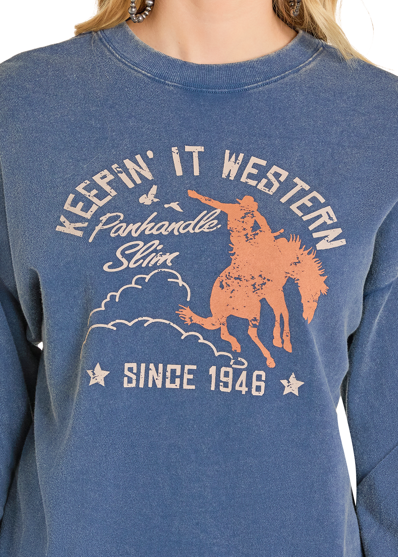 Blue sweatshirt with 'Keepin' It Western' text and horse graphic, featuring Panhandle Slim branding.