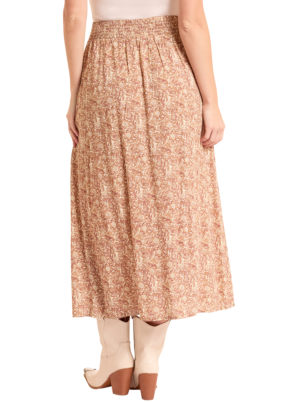 Woman wearing a white sleeveless top and patterned skirt with a beige hat on a white background