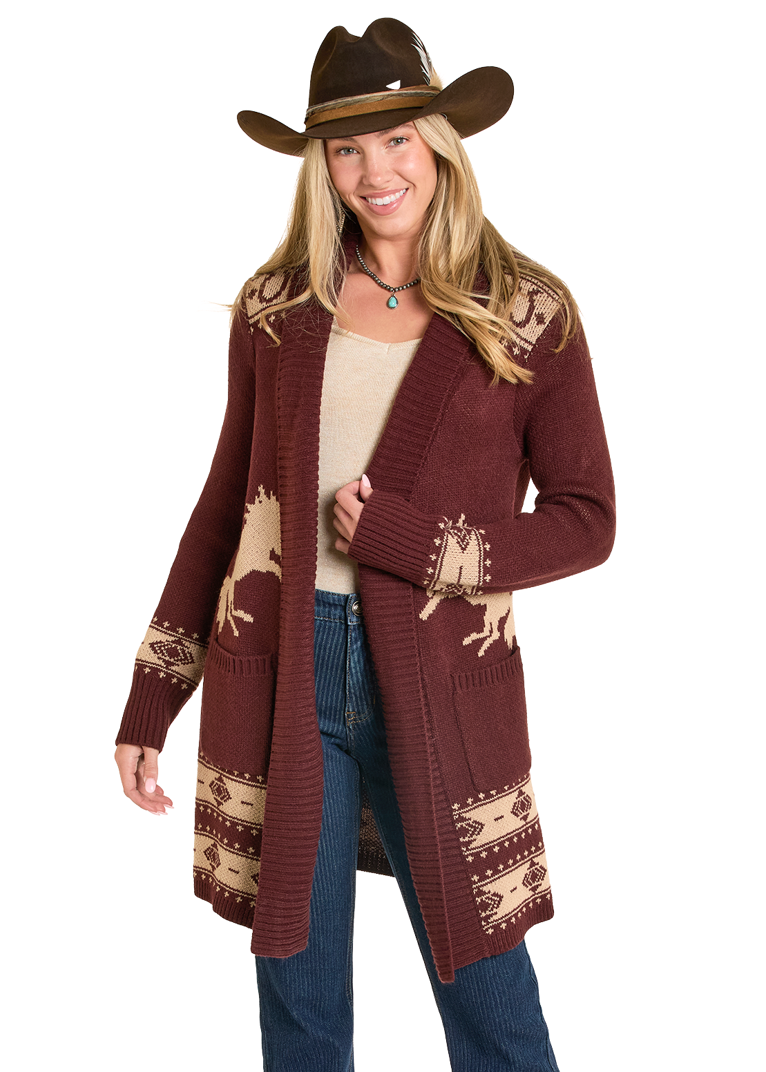 Woman wearing a brown cardigan with animal patterns and a cowboy hat on a white background