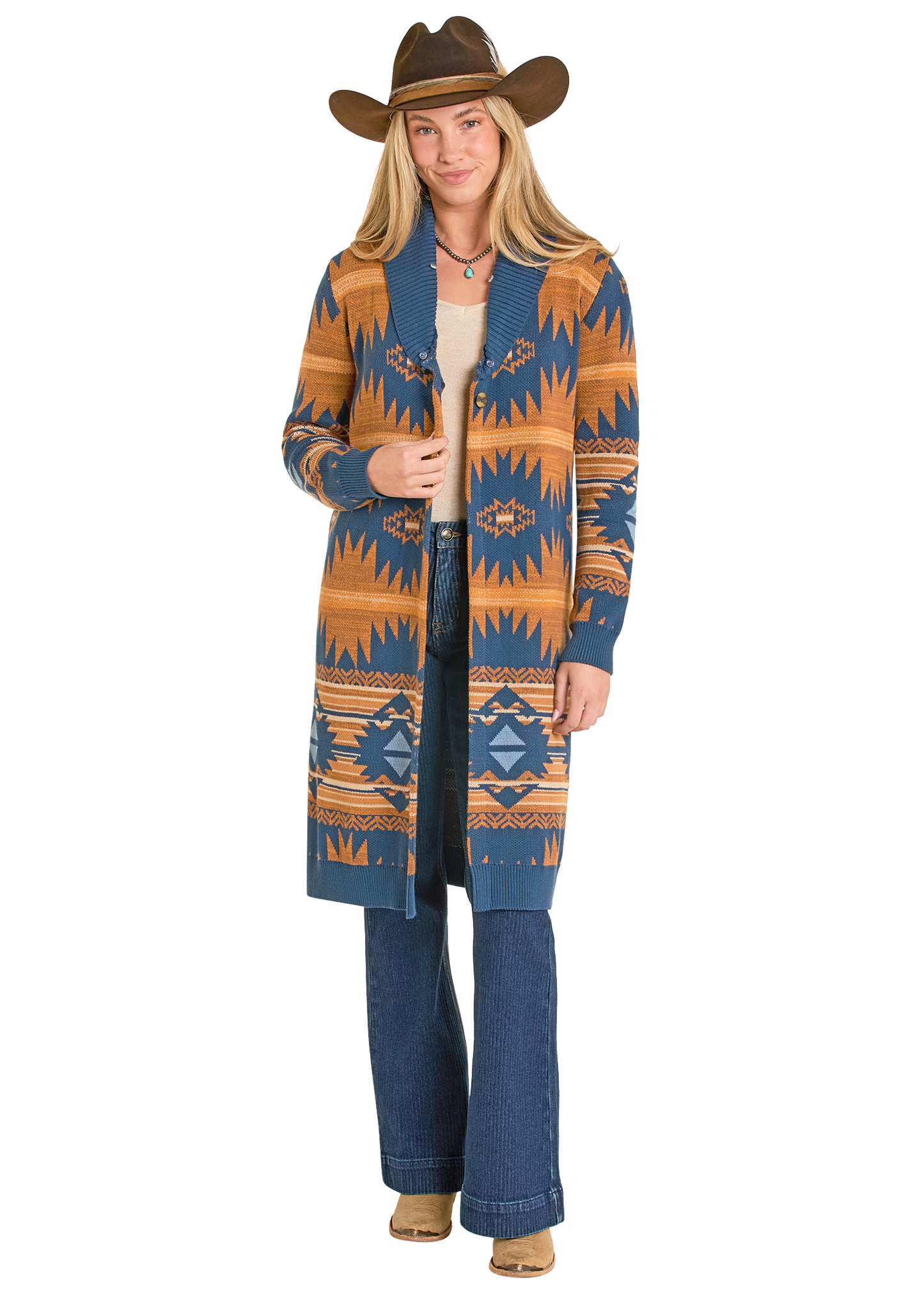 Person wearing a patterned cardigan and cowboy hat on a white background