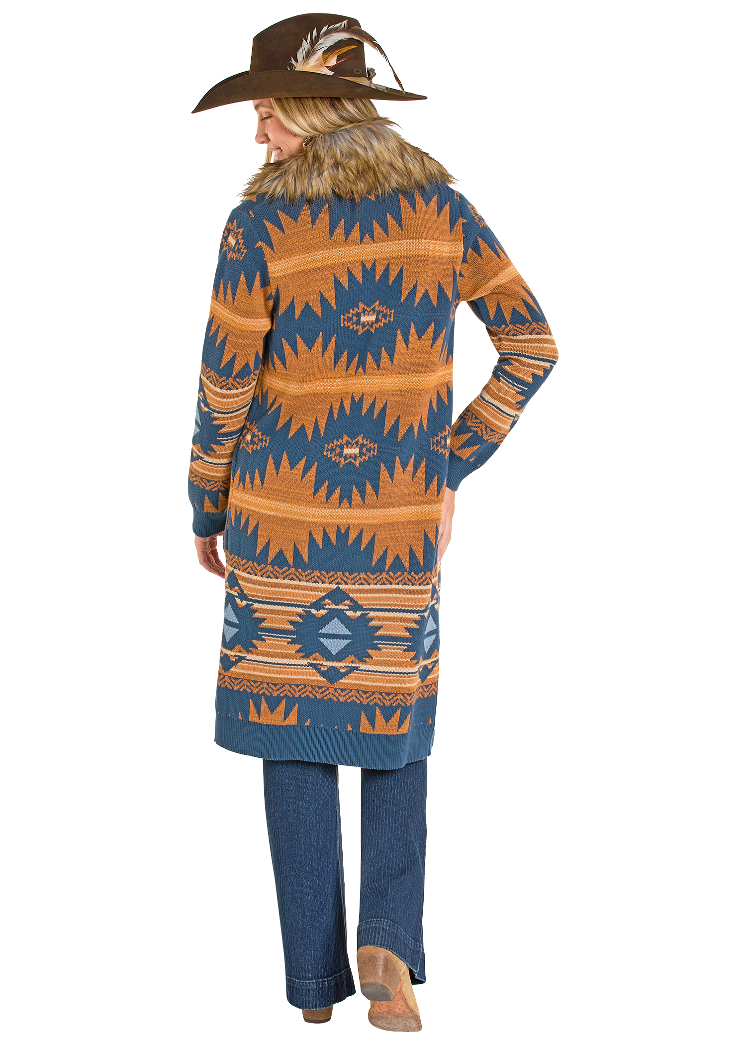 Person wearing a patterned cardigan and jeans on a white background