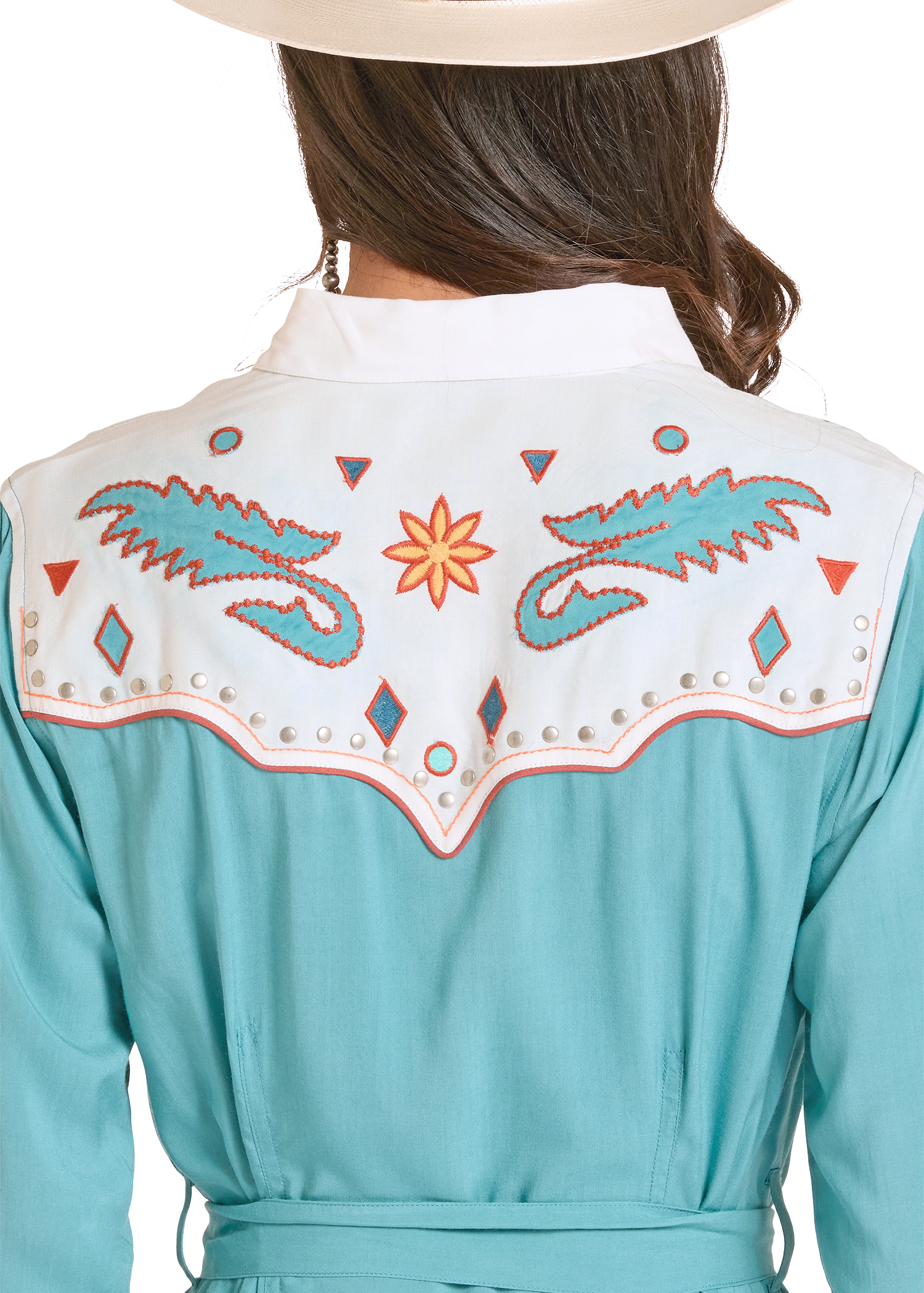 Teal dress with decorative back panel featuring patterns and a star design on a white background.