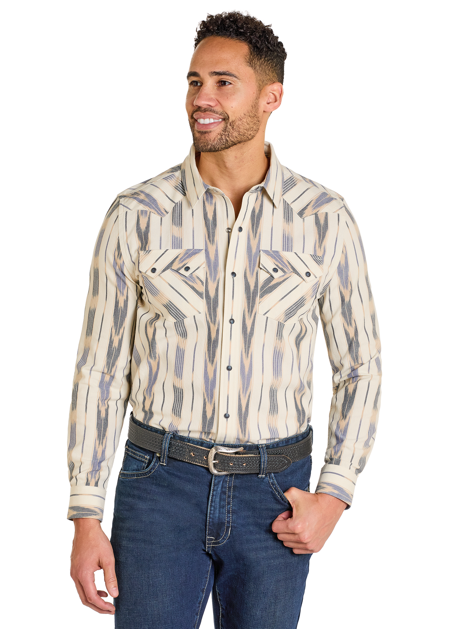 Man wearing a patterned long-sleeve shirt and jeans on a white background