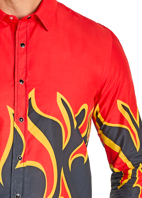 Man wearing a red and black flame-patterned shirt with blue jeans on a white background
