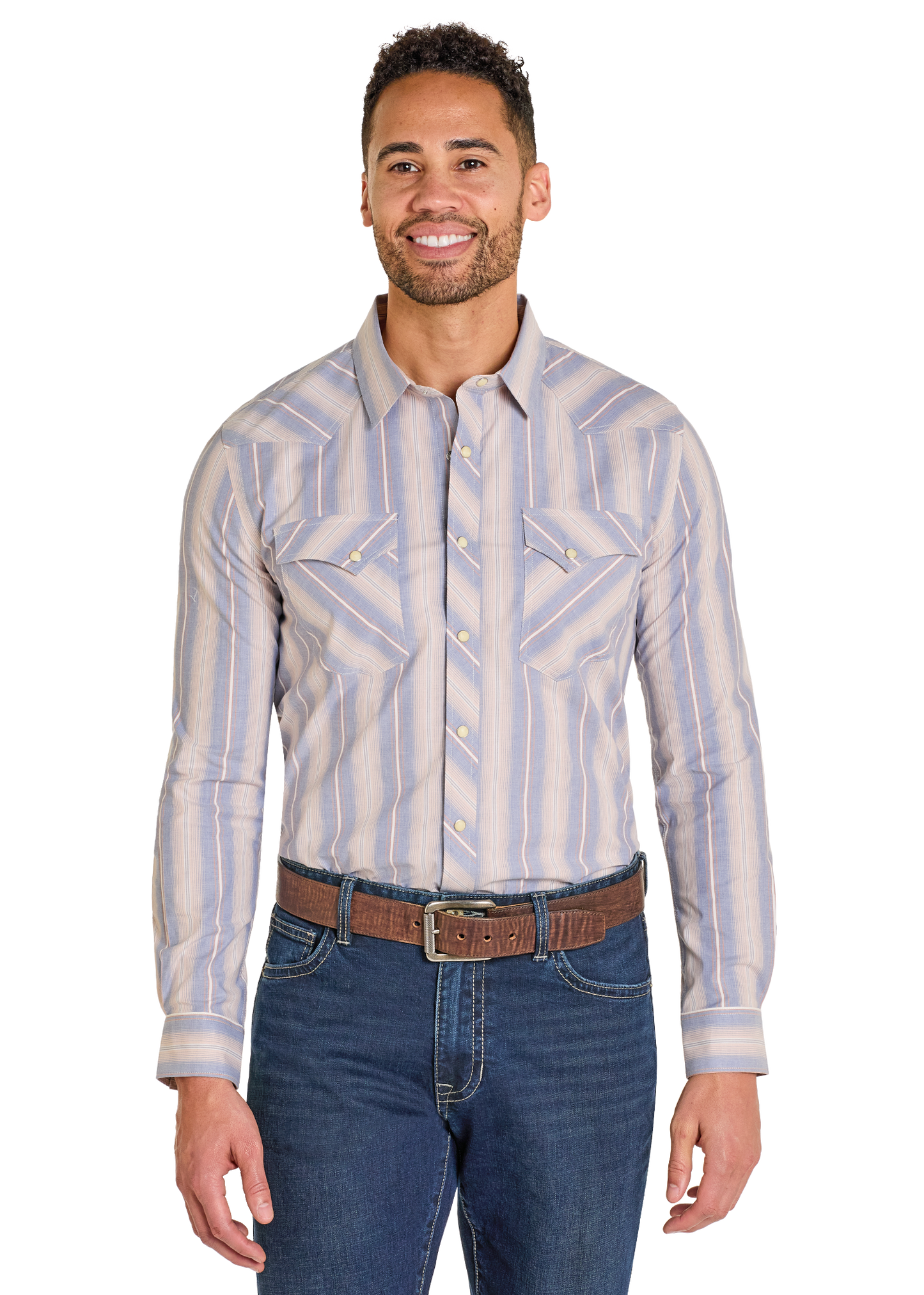 Man wearing a patterned shirt and jeans on a white background