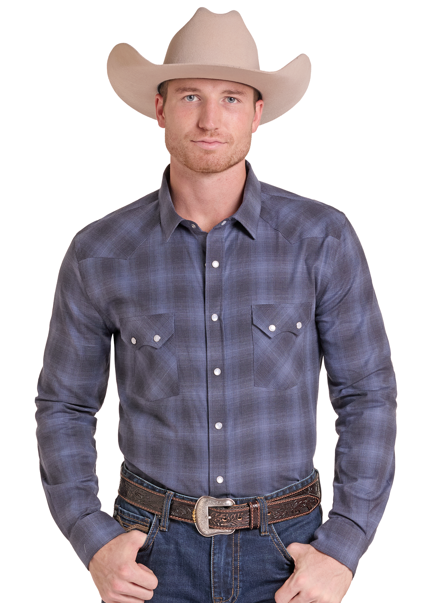 A man wearing a long-sleeve western plaid shirt in slate blue and gray, paired with a tan cowboy hat, brown belt, and blue jeans.