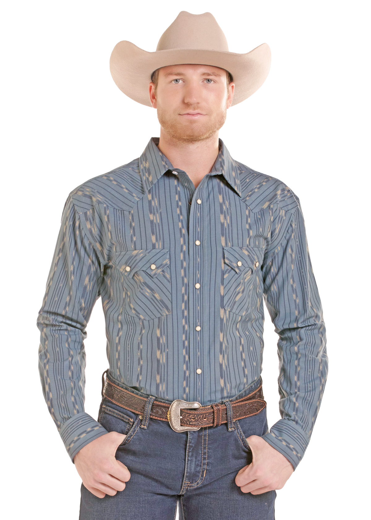 A man wearing a light beige cowboy hat, a blue and beige patterned western long-sleeve button-down shirt, and blue jeans with a brown leather belt, standing against a solid white background.