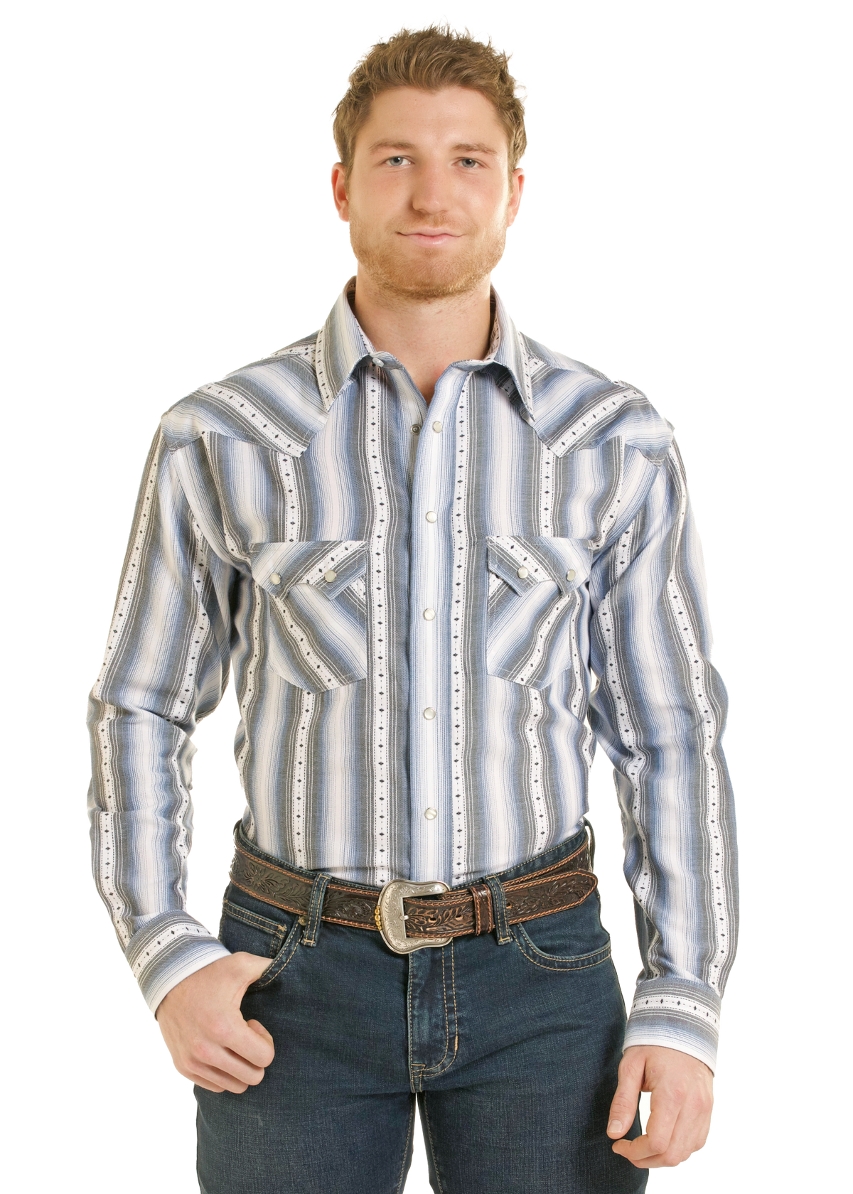 A man wearing a western-style striped shirt with blue and white vertical stripes, silver studs, and a pointed collar, paired with dark blue jeans and a brown belt.