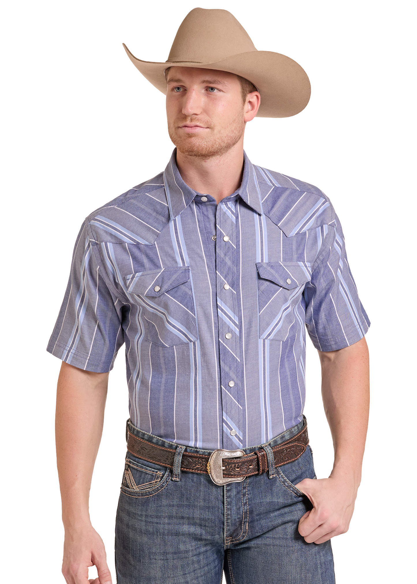 A man wearing a short-sleeve western shirt with vertical blue, gray, and white stripes, paired with a tan cowboy hat, brown belt, and blue jeans.