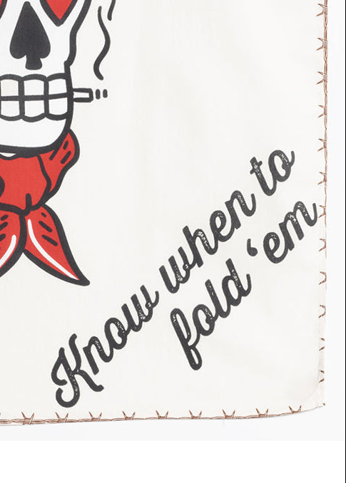 Skull wearing a cowboy hat and red bandana with text and symbols on a white background