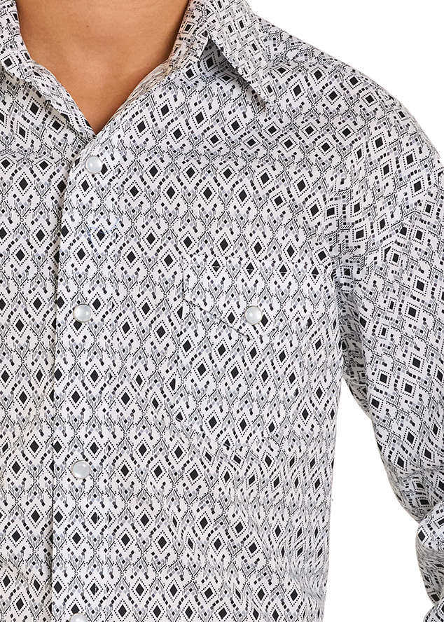 Child wearing a patterned shirt, jeans, and a cowboy hat on a white background